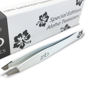 white tweezer with black hibiscus flower, with box